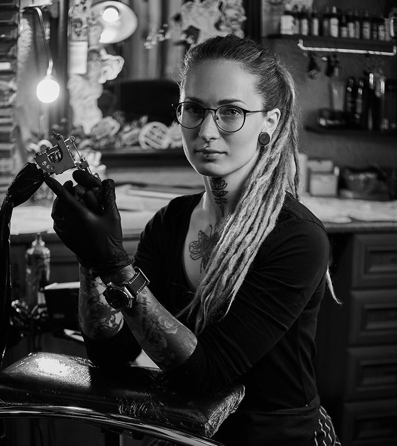 portrait of attractive young woman with tattoo mac X8M2FVM.jpg